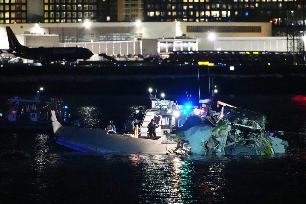 Emergency response units assess airplane wreckage in the Potomac River near Ronald Reagan Washington Airport on January 30, 2025 in Arlington, Virginia.