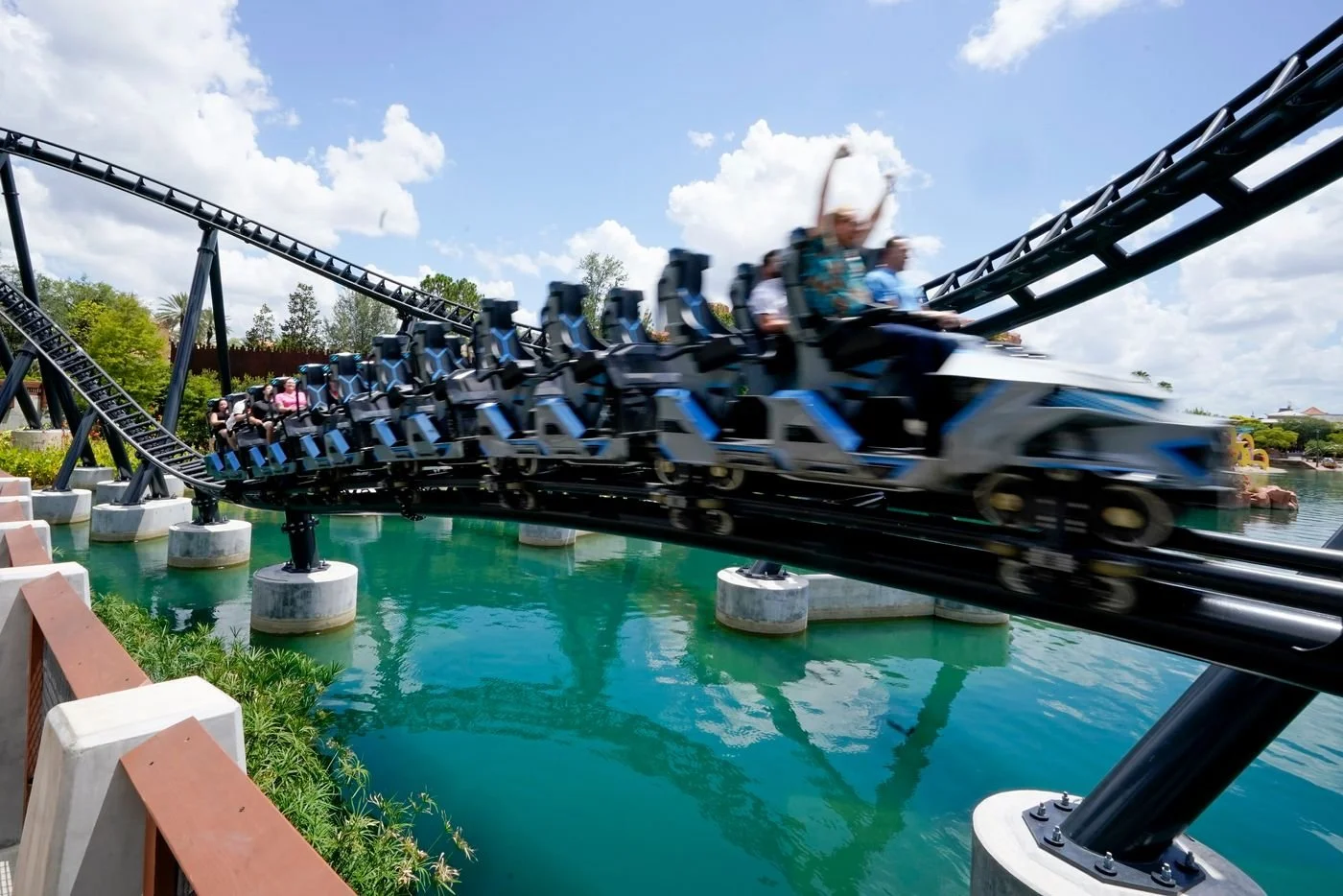Theme Park goers are seen on a rollercoaster